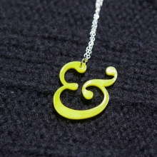 Yellow Williams Caslon Ampersand necklace