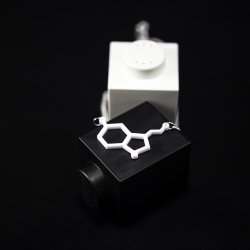 White serotonin molecule necklace